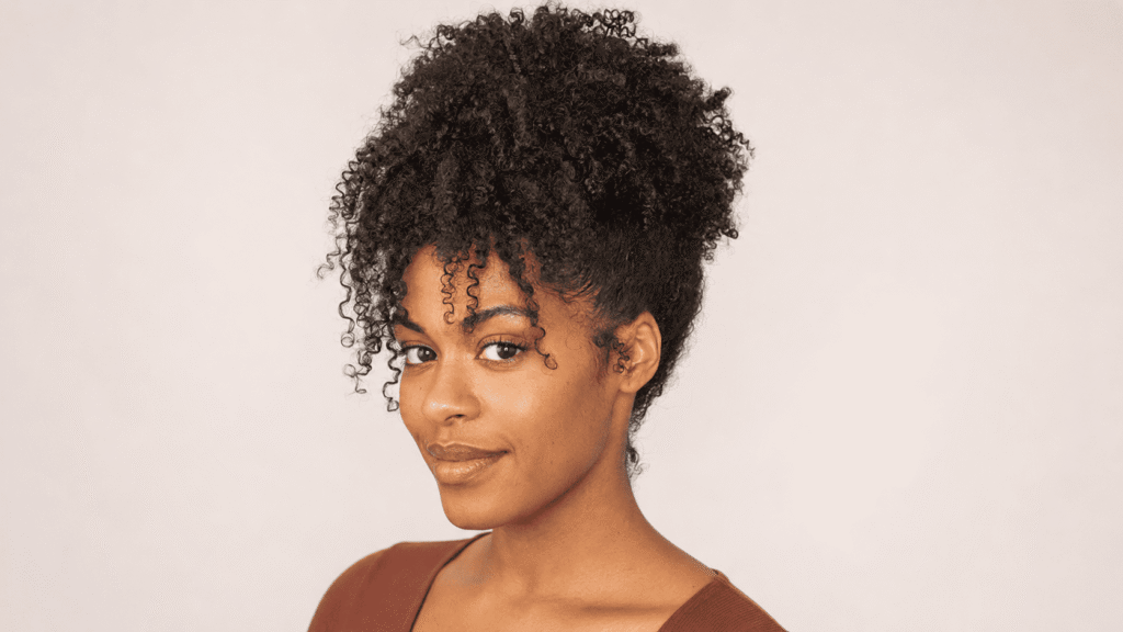 Curly pineapple updo for protecting natural curls in humid weather