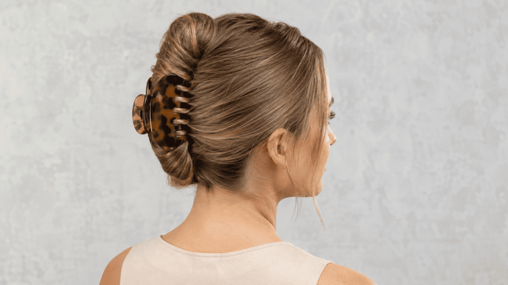 Easy claw-clip French twist hairstyle for humid August weather
