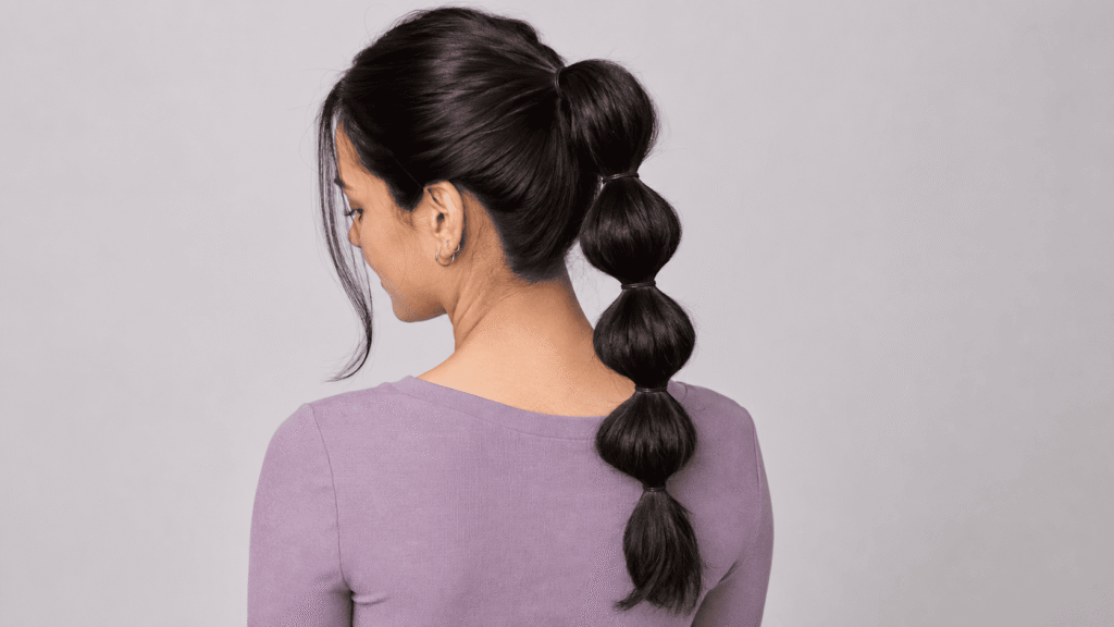 Long bubble ponytail hairstyle that holds in humid summer weather